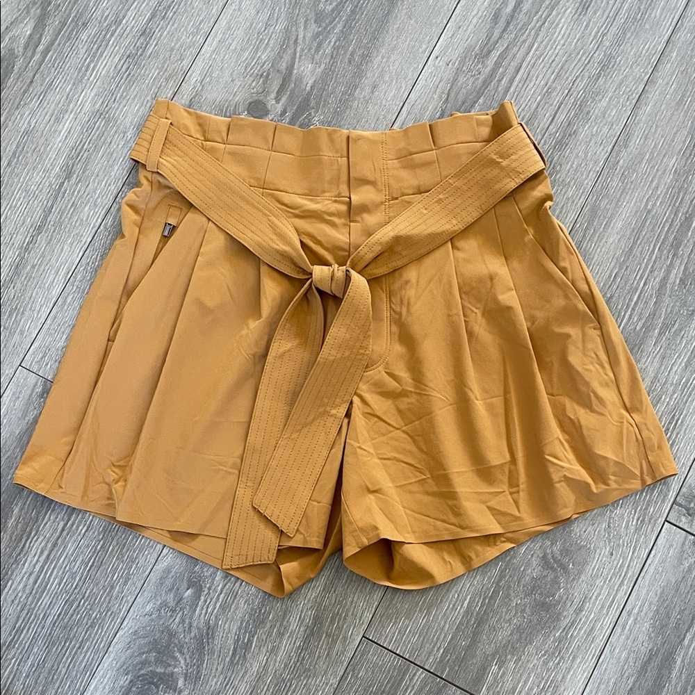 Athleta High-Waist Belted Shorts in Mustard Gold